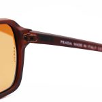 عکس از عینک آفتابی PRADA با فریم خلبانی، رنگ قهوه ای مات و لنز پلاریزه و قهوه ای تیره مدل P9842