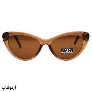 عکس از عینک آفتابی زنانه با فریم استیت، شکل گربه ای، رنگ قهوه ای، دسته چند رنگ، لنز تیره و پلاریزه مدل FG6017