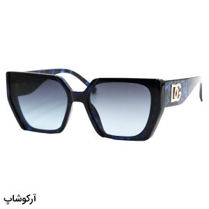 عکس از عینک آفتابی زنانه Dolce & Gabbana با فریم پروانه‌ای، رنگ مشکی و آبی و لنز دودی سایه روشن مدل 7271
