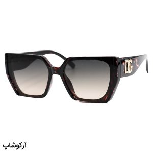عکس از عینک آفتابی زنانه دولچه گابانا با فریم پروانه ای، رنگ مشکی و قهوه ای و لنز سایه روشن مدل 7271