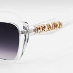 عکس از عینک آفتابی زنانه PRADA با فریم پروانه ای، بی رنگ، شفاف و لنز دودی هایلایت مدل 2837