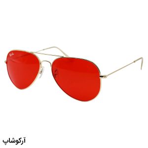 عکس از عینک دید در شب ریبن با فریم طلایی رنگ، شکل خلبانی و هوانوردی و لنز قرمز رنگ مدل RB3026