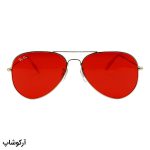 عکس از عینک دید در شب ریبن با فریم طلایی رنگ، شکل خلبانی و هوانوردی و لنز قرمز رنگ مدل RB3026