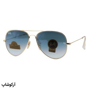 عکس از عینک آفتابی Ray-Ban با فریم خلبانی، رنگ طلایی، عدسی سنگ و آبی سایه روشن مدل RB3026