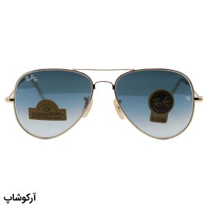 عکس از عینک آفتابی Ray-Ban با فریم خلبانی، رنگ طلایی، عدسی سنگ و آبی سایه روشن مدل RB3026