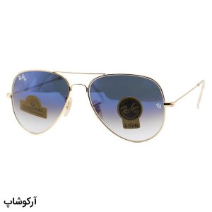 عکس از عینک آفتابی Ray-Ban با فریم خلبانی، رنگ طلایی، لنز شیشه، رنگ آبی، آینه‌ای و سایه روشن مدل RB3026