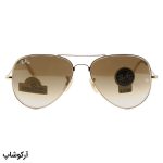 عکس از عینک آفتابی Ray-Ban با فریم خلبانی، رنگ طلایی، لنز سنگ و قهوهای سایه روشن مدل RB3026