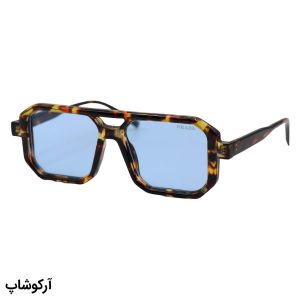 عکس از عینک دید در شب PRADA با فریم مربعی شکل، رنگ هاوانا براق و لنز آبی رنگ مدل ZN3903
