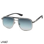 عکس از عینک آفتابی Cartier با فریم شکل هندسی، رنگ نقره‌ای، دسته چوبی و لنز سبز سایه روشن مدل 2524