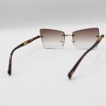 عکس از عینک آفتابی زنانه Moscot فریملس، لنز قهوه‌ای سایه روشن، طرح گربه‌ای و دسته قهوه‌ای مدل M6244