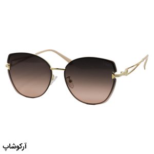 عکس از عینک آفتابی زنانه Dior با فریم شکل چشم گربه‌ای، رنگ کرمی و لنز قهوه‌ای گرادینت مدل 2568