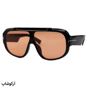 عکس از عینک دید در شب Tom Ford با فریم مشکی رنگ، شکل خلبانی و لنز رنگ نارنجی مدل 96500