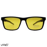 عکس از عینک دید در شب پلاریزه Ray-Ban با فریم رنگ مشکی مات، شکل مستطیلی و لنز زرد رنگ مدل PL003