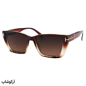 عکس از عینک آفتابی زنانه Tom Ford با فریم قهوه‌ای رنگ، شکل چشم گربه‌ای و لنز قهوه‌ای سایه روشن مدل 0920