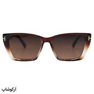 عکس از عینک آفتابی زنانه Tom Ford با فریم قهوه‌ای رنگ، شکل چشم گربه‌ای و لنز قهوه‌ای سایه روشن مدل 0920