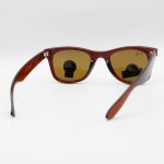 عکس از عینک آفتابی Ray-Ban با فریم ویفرر، رنگ قهوه‌ای و لنز قهوه‌ای تیره و جنس شیشه‌ای (سایز کوچک) مدل RB2140-S