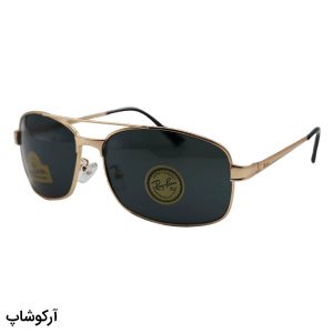 عکس از عینک آفتابی ریبن با فریم طلایی مات، شکل خلبانی و لنز دودی تیره و از جنس شیشه مدل RB3317