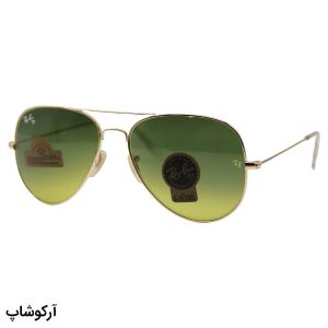 عکس از عینک آفتابی Ray-Ban با فریم خلبانی، رنگ طلایی، لنز سنگ و سبز تیره و سایه روشن مدل RB3026 HQ
