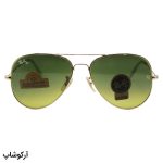 عکس از عینک آفتابی Ray-Ban با فریم خلبانی، رنگ طلایی، لنز سنگ و سبز تیره و سایه روشن مدل RB3026 HQ