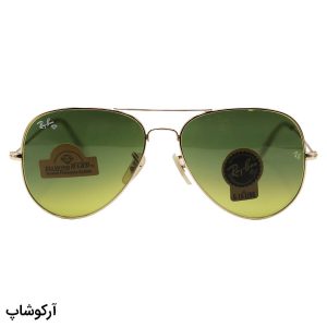 عکس از عینک آفتابی Ray-Ban با فریم خلبانی، رنگ طلایی، لنز سنگ و سبز تیره و سایه روشن مدل RB3026 HQ