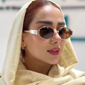 عکس از عینک آفتابی سلین (CELINE) با فریم بیضی شکل، ترند و جدید بر روی صورت مدل