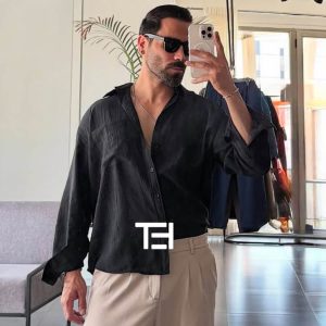 عکس از عینک آفتابی Ray-Ban با فریم ویفرر، لنز شیشه و مدل RB2140 بر روی صورت