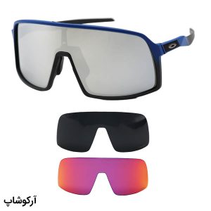 عکس از عینک ورزشی اوکلی با فریم رنگ مشکی و آبی، جنس کائوچو و 2 کاور لنز و تجهیزات کامل مدل OO9406-1837