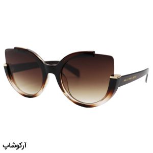 عکس از عینک آفتابی زنانه با فریم چشم گربه‌ای، رنگ قهوه‌ای و لنز قهوه‌ای سایه روشن مارک جیکوبز مدل 8252