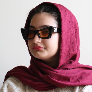 عکس از عینک آفتابی OFF-WHITE با فریم فانتزی و گربه ای مدل XH3336 بر روی صورت فاطمه ابراهیم زاده