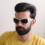 عکس از عینک آفتابی فانتزی PRADA با فریم بیس‌دار، بیضی شکل مدل 3346 بر روی صورت محمدحسین ابراهیم زاده