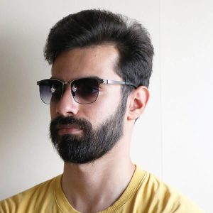 عکس از عینک آفتابی IC! BERLIN با فریم مربعی شکل مدل PS18008 بر روی صورت محمدحسین ابراهیم زاده