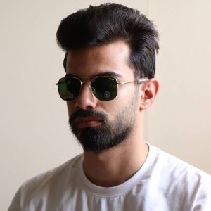 عکس از عینک آفتابی RANDOLPH با فریم رنگ شکل مربعی، لنز از جنس سنگ و سایز 55 مدل 55-215 بر روی صورت محمدحسین ابراهیم زاده
