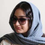 عکس از عینک آفتابی پرادا با فریم مربعی شکل مدل 8084 بر روی صورت فاطمه ابراهیم زاده