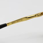 عکس از عینک آفتابی Ray-Ban با فریم خلبانی، بیس دار، طلایی رنگ، لنز سبز تیره، آنتی رفلکس و از جنس شیشه مدل RB8327