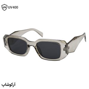 عکس از عینک آفتابی Prada با فریم مستطیلی شکل، رنگ سبز شفاف و لنز دودی تیره مدل N3941