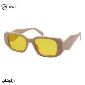 عکس از عینک دید در شب PRADA با فریم مستطیلی شکل، رنگ کرمی و لنز زرد رنگ مدل N3941