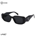 عکس از عینک آفتابی PRADA با فریم مستطیلی شکل، رنگ طوسی تیره و لنز دودی تیره مدل N3941
